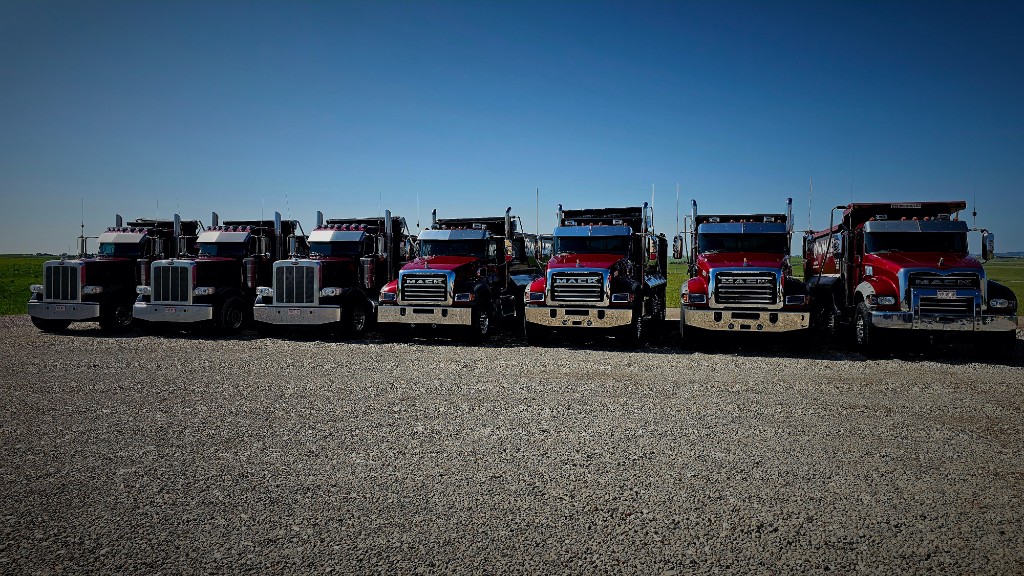 WayMaker Companies quad-axle dump truck fleet lined up