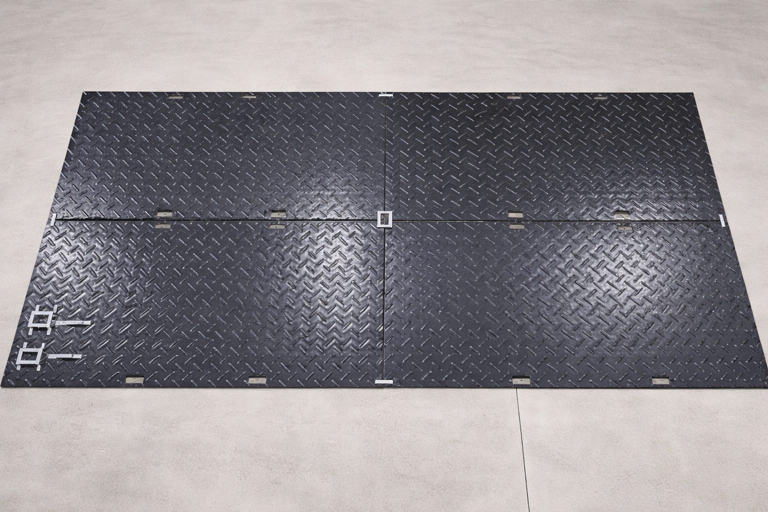 Four ground mats in a connected grid