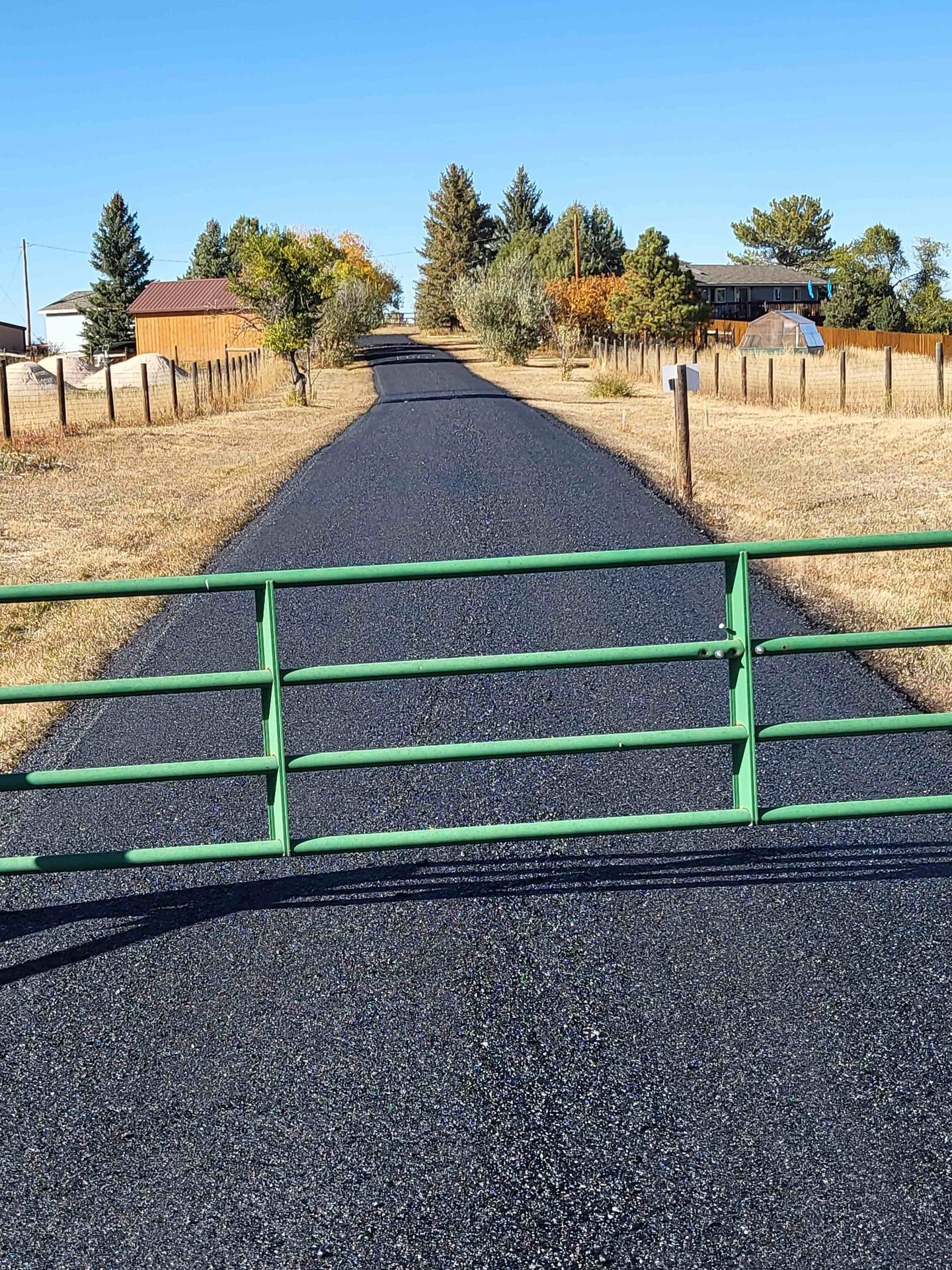 New recycled asphalt driveway with sealcoat